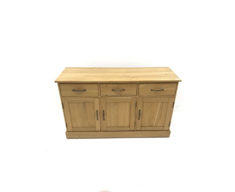 Light oak sideboard,  three drawers above three cupboards on plinth base, W137cm - Condition Report 