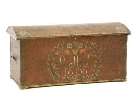 A Scandinavian painted dome top trunk, red with floral decoration and initials A A S, 1836, 110cm wide, 51cm deep, 56cm high