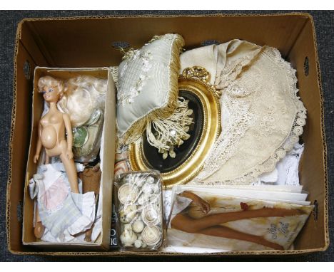 Two dolls tea sets, a pregnant doll and related book, together with a small quantity of textiles