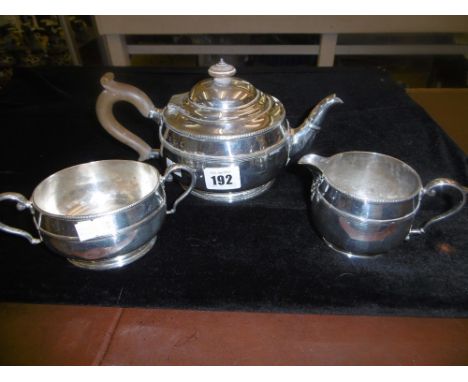 A MAPPIN AND WEBB HM STERLING SILVER THREE PIECE TEA SET