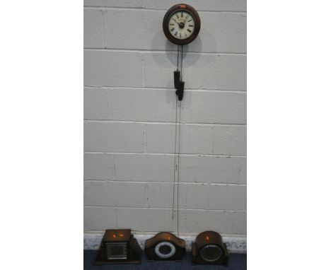 AN EARLY 20TH CENTURY OAK POSTMAN'S WALL CLOCK, the 5.5 inch enamel dial, depicting Roman numerals, signed N.Mukle, 21 Ferdin