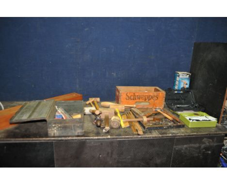 A TRAY, A WOODEN CRATE, A METAL BOX CONTAINING TOOLS including three hide mallets, carving mallets, joiners, rules, hammers, 