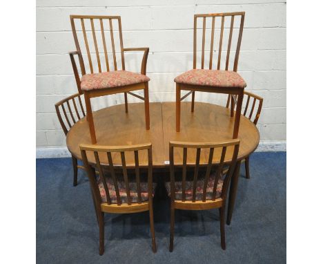 A MID CENTURY G PLAN TEAK OVAL EXTENDING TABLE, with a single fold out leaf, raised on cylindrical tapered legs, length 164cm