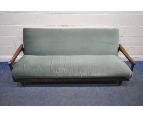 A MID CENTURY TEAK FRAME SOFA BED, with green fabric upholstery, swept open armrests raised on tapered legs, length 200cm x d