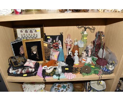 A LARGE QUANTITY OF VINTAGE BEADWORK to include a large group of small beaded pouches, ten female figures with beaded dresses