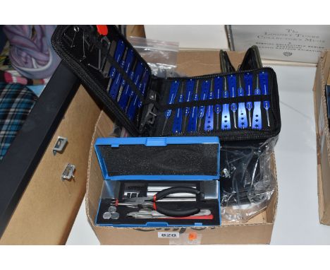 A BOX OF LOCKSMITH'S TOOLS to include three pouches of Multipick tools, an H &amp; K pouch of assorted tools, and a Kom 'Mast