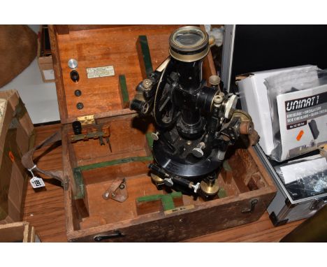A CASED THEODOLITE, comprising a Cooke, Troughton &amp; Simms Ltd theodolite, no 35177, black and brass finish, in a fitted w