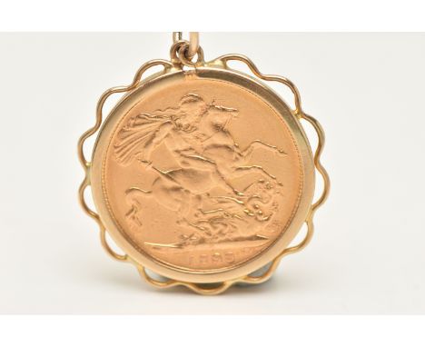 A MOUNTED VICTORIAN FULL GOLD SOVEREIGN COIN, depicting Queen Victoria, dated 1898, Melbourne Mint, collet set within a scall