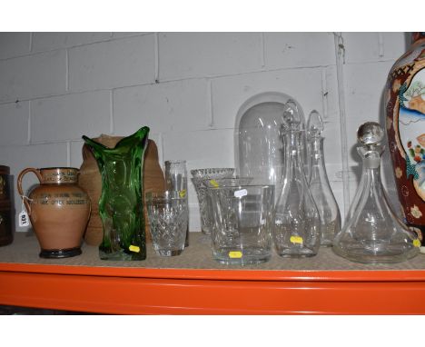 A GROUP OF GLASS AND STONEWARE ITEMS comprising a large glass dome, height of approximately 42cm (some nibbles to the rim), f
