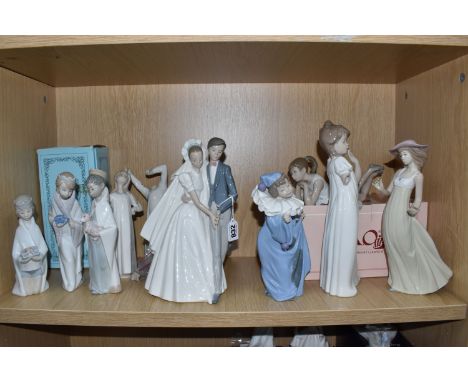 A GROUP OF TEN LLADRO AND NAO FIGURINES to include five Lladro figurines comprising 'Melchor King' No. 4673, designed by Juan