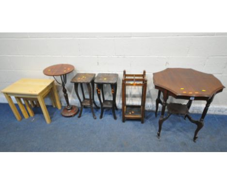 A 20TH CENTURY MAHOGANY OCTAGONAL CENTRE TABLE, raised on turned supports, and shaped legs, with castors, united by an unders