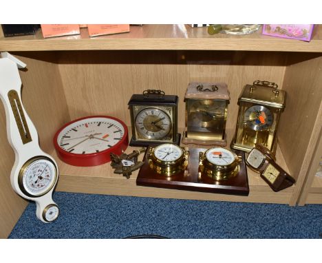 A GROUP OF CLOCKS, comprising Staiger, Hermle and Metamec mantel clocks, a Jones wall clock, a Comitti of London wall clock a
