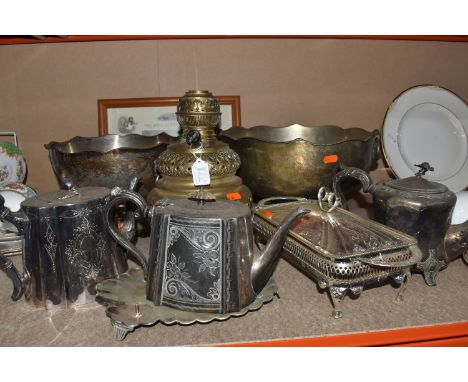 A QUANTITY OF MOSTLY PLATED METALWARES to include three plated teapots, one marked James Allan to the base, one with five 'ha