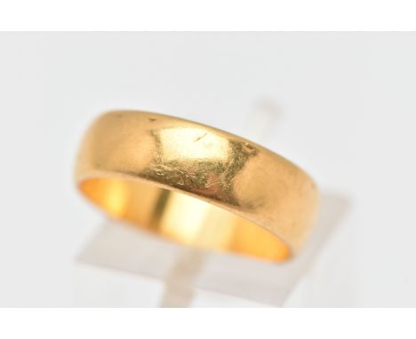 A 22CT GOLD POLISHED WIDE BAND RING, approximate band width 5.6mm, hallmarked 22ct London, ring size L 1/2 centre, approximat