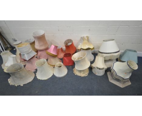 A LARGE SELECTION OF LAMP SHADES, all varying in shape, size, style, colour, etc, along with two  bamboo roller blinds, condi