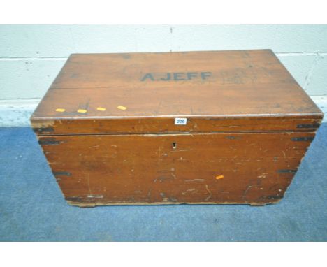 AN EARLY 20TH CENTURY CAMPHORWOOD TRAVELLING TRUNK, with brass banding, twin metal handles, A.JEFF signed to the top, width 8