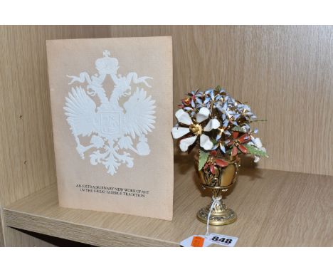A FRANKLIN MINT 'THE IMPERIAL RUSSIAN BOUQUET', designed by Igor Carl Fabergé, the enamelled flowers in a gilt vase, height 1