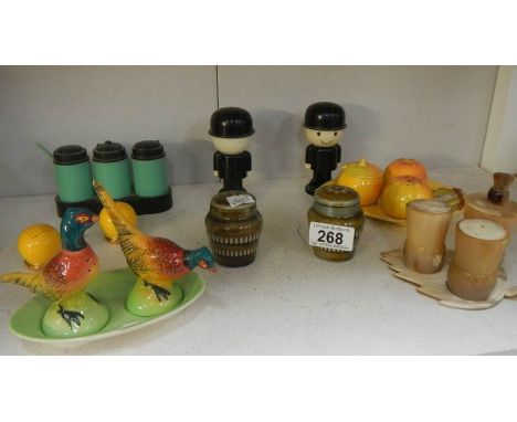 A mixed lot of collectable salt & pepper pots including Royal Worcester and Carlton ware