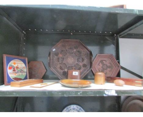 A shelf of wooden items 