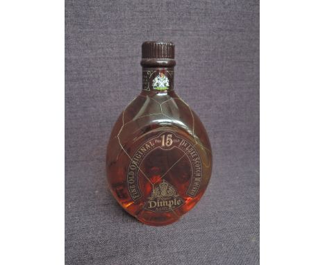A bottle of Dimple Fine Old Original 15 Year Old De Luxe Scotch Whisky, blended, 75cl, 43% vol