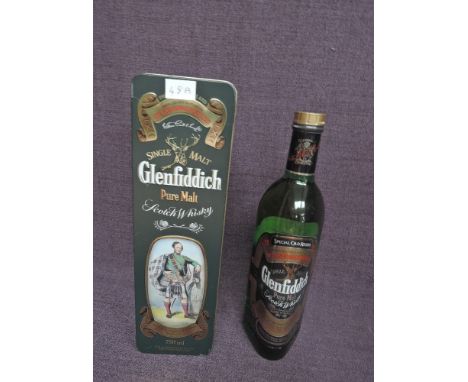 A bottle of 1980's Glenfiddich Single Malt Scotch Whisky, Clans of the Highlands of Scotland, Macpherson, 750ml, 40% vol in p