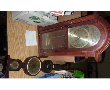 Tempus Fugit cased wall clock and a modern barometer
