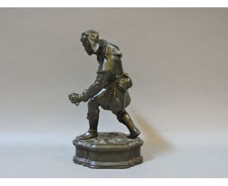An early 20th century bronze after Giambologna, of a wild flower on a shaped base, 26cm tall