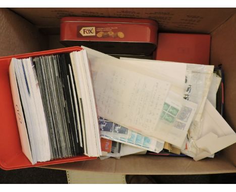 A large quantity of GB first day covers, presentations packs and mint stamps