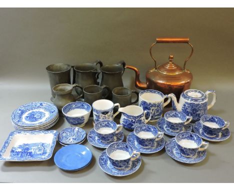 A copper kettle, and six pewter pub mugs, including 'Hop Pole', Bedford, 'Brickmaker's Arms', etc