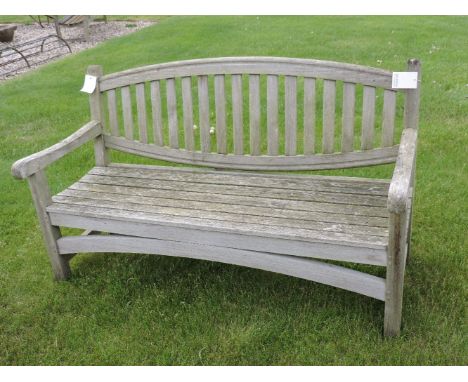A teak garden bench, 150cm wide, and a pair of armchairs