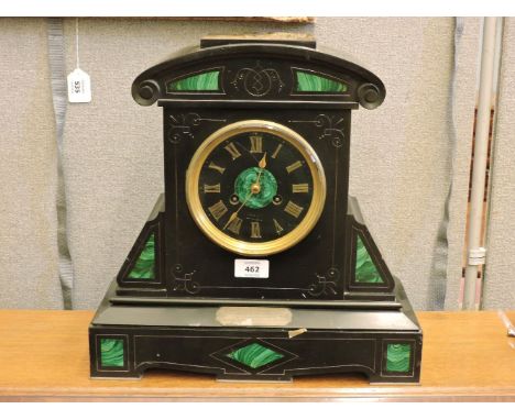 A Victorian black slate and malachite inset mantel clock