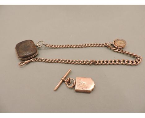A 9ct gold curb link watch chain, with a 9ct gold bloodstone and compass swivel fob, small leather purse, and an engraved loc