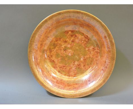 A Wedgwood orange lustre basin, decorated with gilt fish, pattern no 24826, 33cm diameter