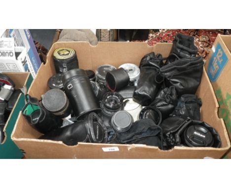 A COLLECTION OF NIKON, OLYMPUS AND OTHER CAMERA LENSES mostly in bags