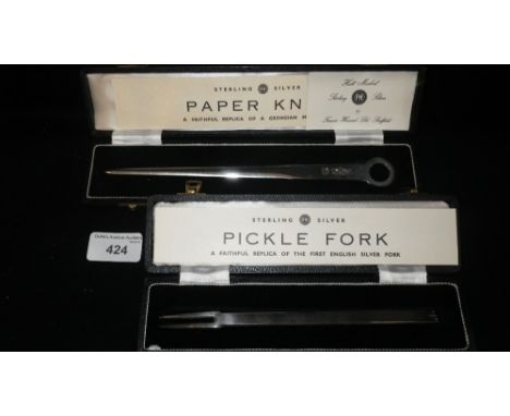 A STERLING SILVER PAPER KNIFE and a Sterling silver pickle fork (2)