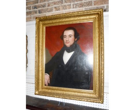 A 19TH CENTURY OIL ON CANVAS PORTRAIT of a gentleman in a heavy gilt frame