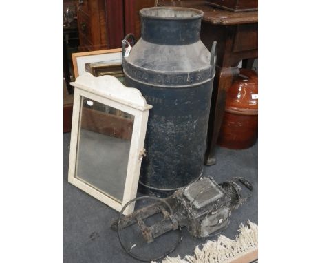 A UNITED DAIRIES MILK CHURN, a carriage lamp fitted for electricity and wall mounted and a painted framed mirror