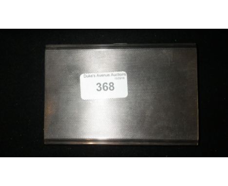 A SILVER CIGARETTE CASE with engine-turned decoration