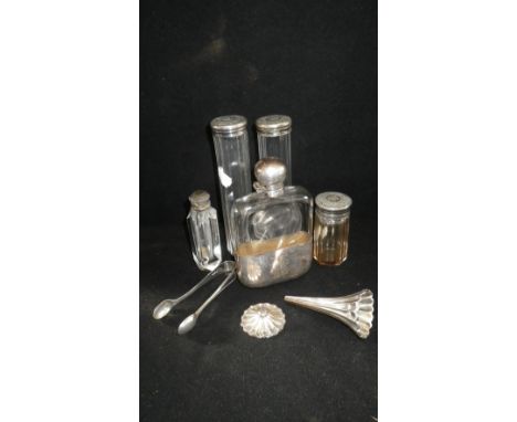 A LARGE SILVER MOUNTED SPIRIT FLASK and a collection of silver mounted dressing table jars