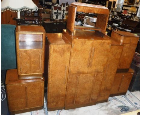 AN ART DECO BIRDS-EYE MAPLE PART BEDROOM SUITE, with stamp 'Vesper Furniture', comprising cabinet, 45" wide with an arrangeme