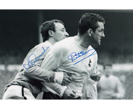 Autographed SUMMERBEE / MACKAY 12 x 8 photo black and white, depicting MIKE SUMMERBEE of Manchester City grappling with DAVE 