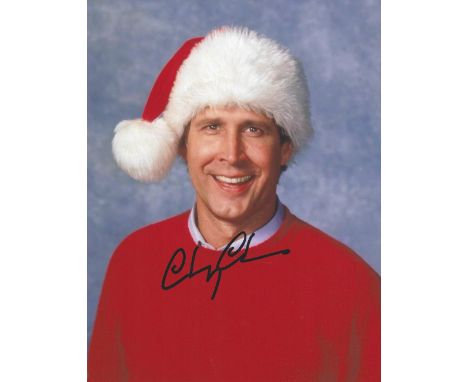 Actor, Chevy, Chase signed National Lampoon's Christmas Vacation 10x8 colour photograph. Chase (born October 8, 1943) is an A