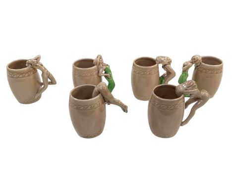 LUCKY; a set of six mid 20th century Japanese ceramic mugs, with figural handles modelled as a lady gradually undressing, hei