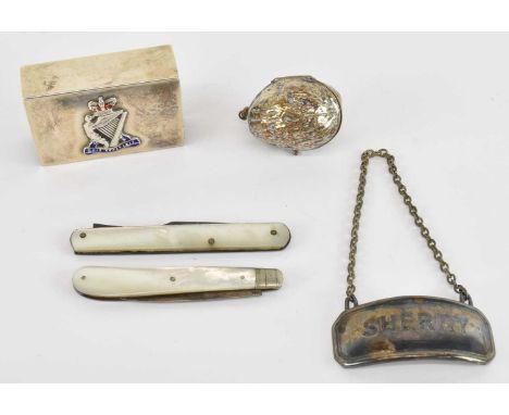 A George V hallmarked silver matchbox holder, Birmingham 1918, 6 x 4cm, a silver plated 'Sherry' decanter label, a white meta