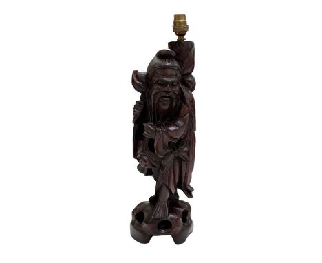 A modern Chinese carved rootwood table lamp modelled as Shou Lao, height 47cm.