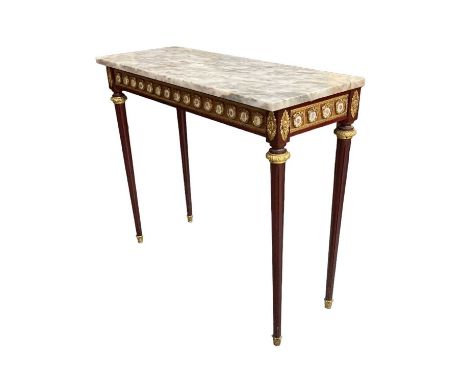 A French reproduction mahogany and gilt metal mounted marble topped rectangular hall table, inset with hand painted ceramic p