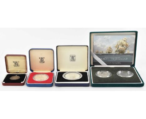 THE ROYAL MINT; a cased 200th Anniversary Nelson Trafalgar coin set comprising two silver five pound coins, a cased Elizabeth