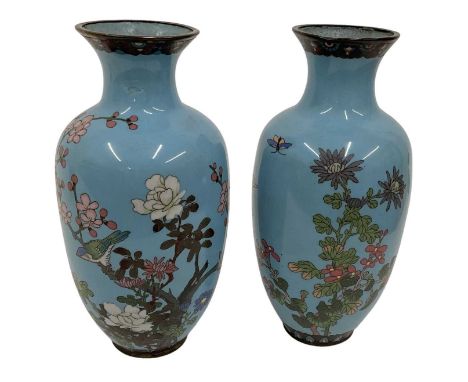 A pair of 19th century blue ground cloisonné enamel vases, decorated with birds amongst foliage, height 24cm.