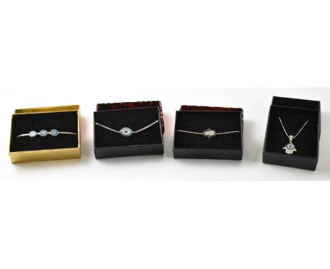 A 925 hallmarked silver pendant set with white, blue, turquoise and black stones, suspended on a 925 hallmarked silver neckla