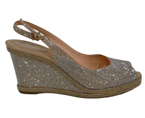 RENÉ CAOVILLA; a pair of silver bead decorated lady's wedge shoes, size 39.